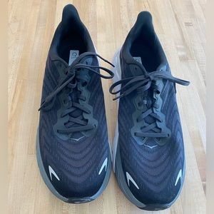 Hoka black sneakers, size 11.5 for men.